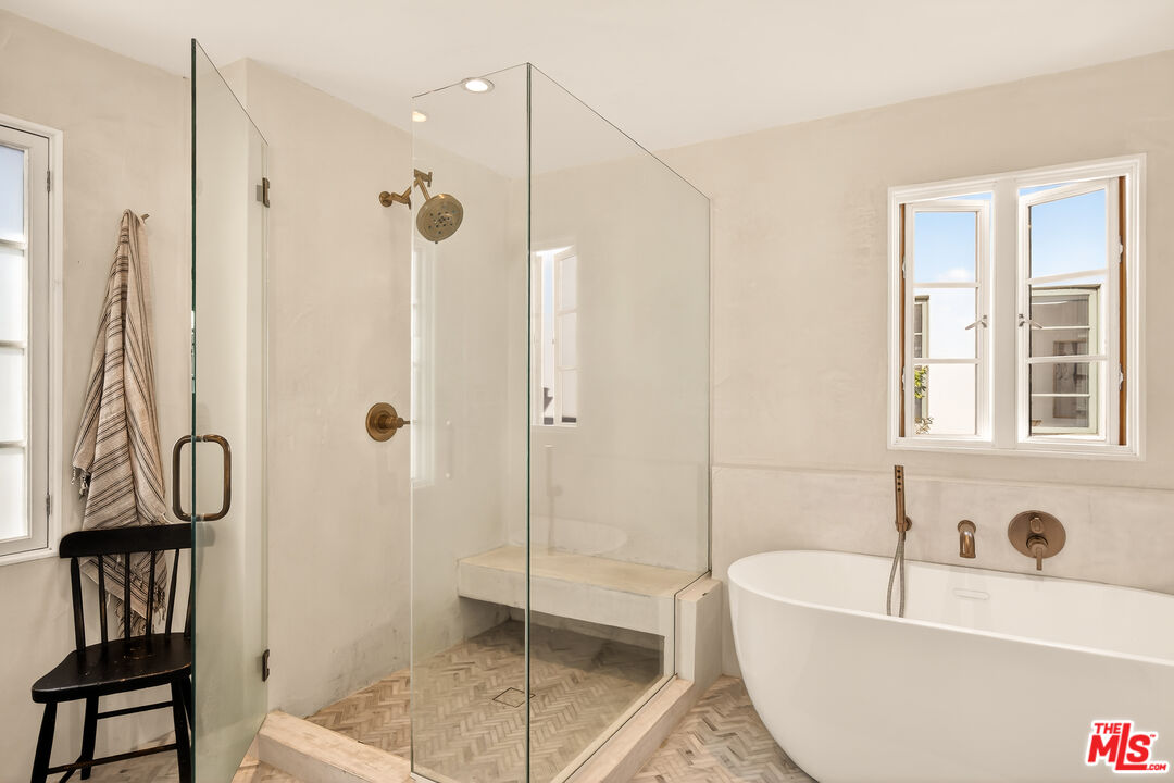 3128 Stanford Avenue Venice, CA 90292 - Photo 32 of 43 a bathroom with a tub a sink and a shower