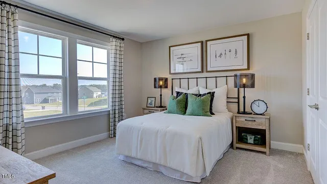an aerial view of a house with a ocean view