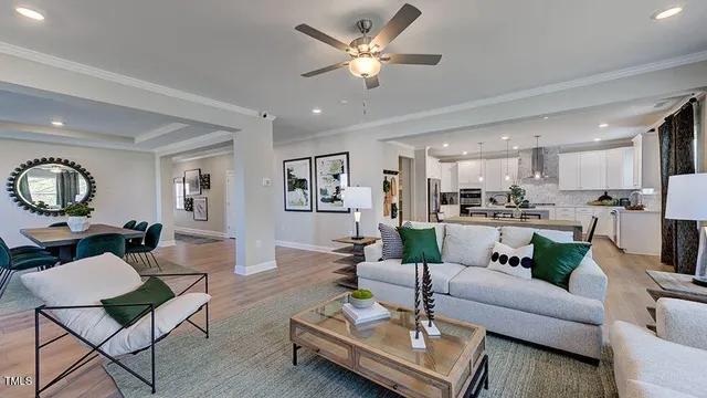 a large kitchen with a table and chairs