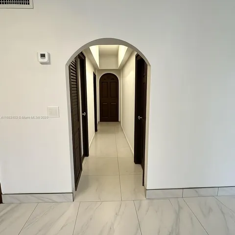 a view of entryway with washer and dryer