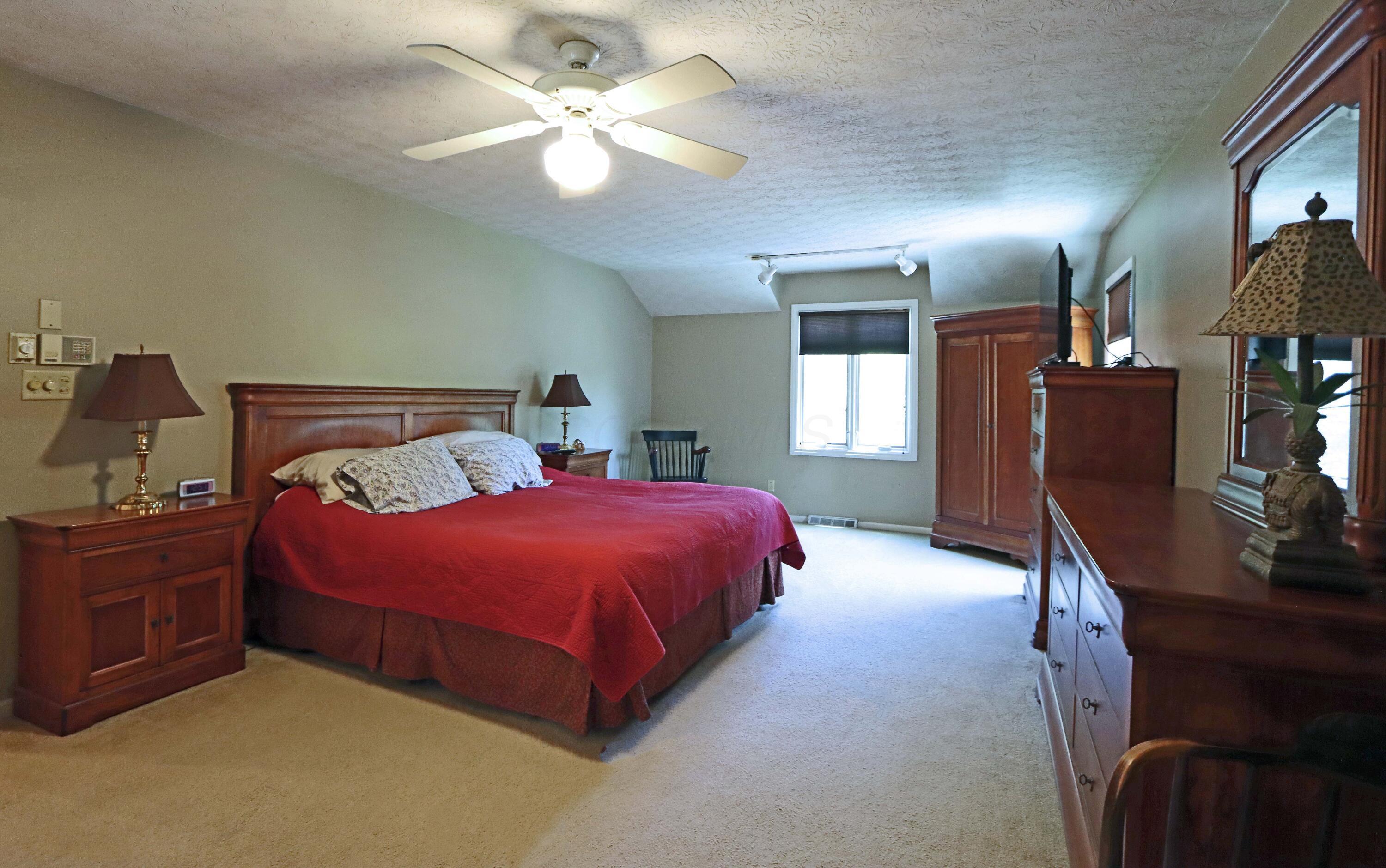 3969 Newhall Road Upper Arlington, OH 43220 - Photo 53 of 82 primary suite with separate heating and cooling, hardwood flooring under the rug