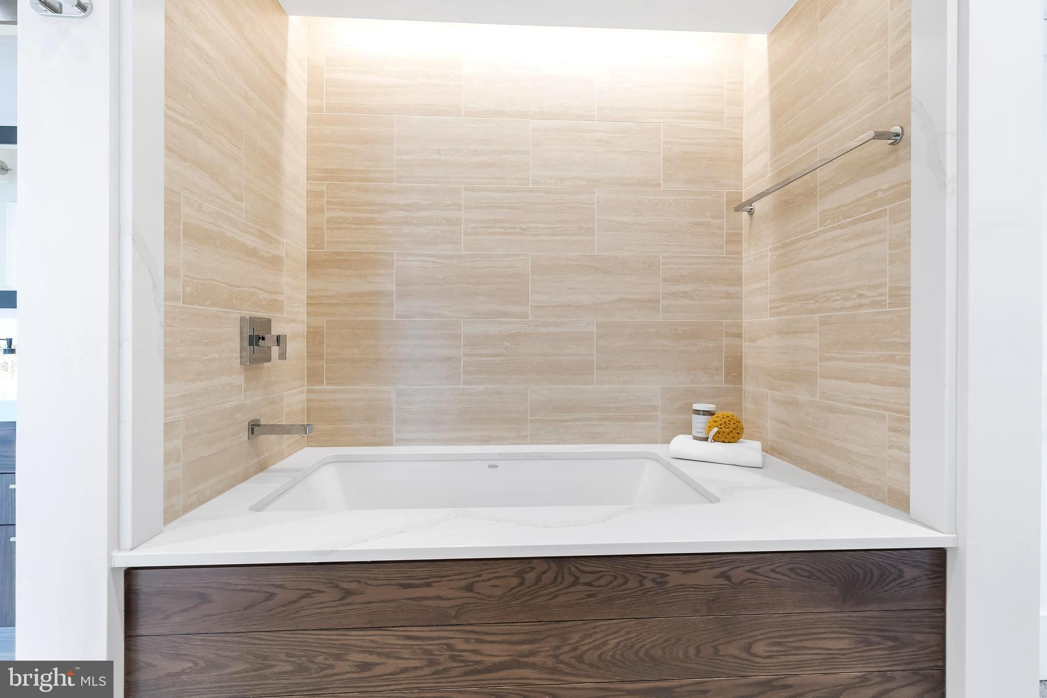 1600 Arch Street, Unit 1621 Philadelphia, PA 19103 - Photo 22 of 46 a bathroom with a bathtub and shower