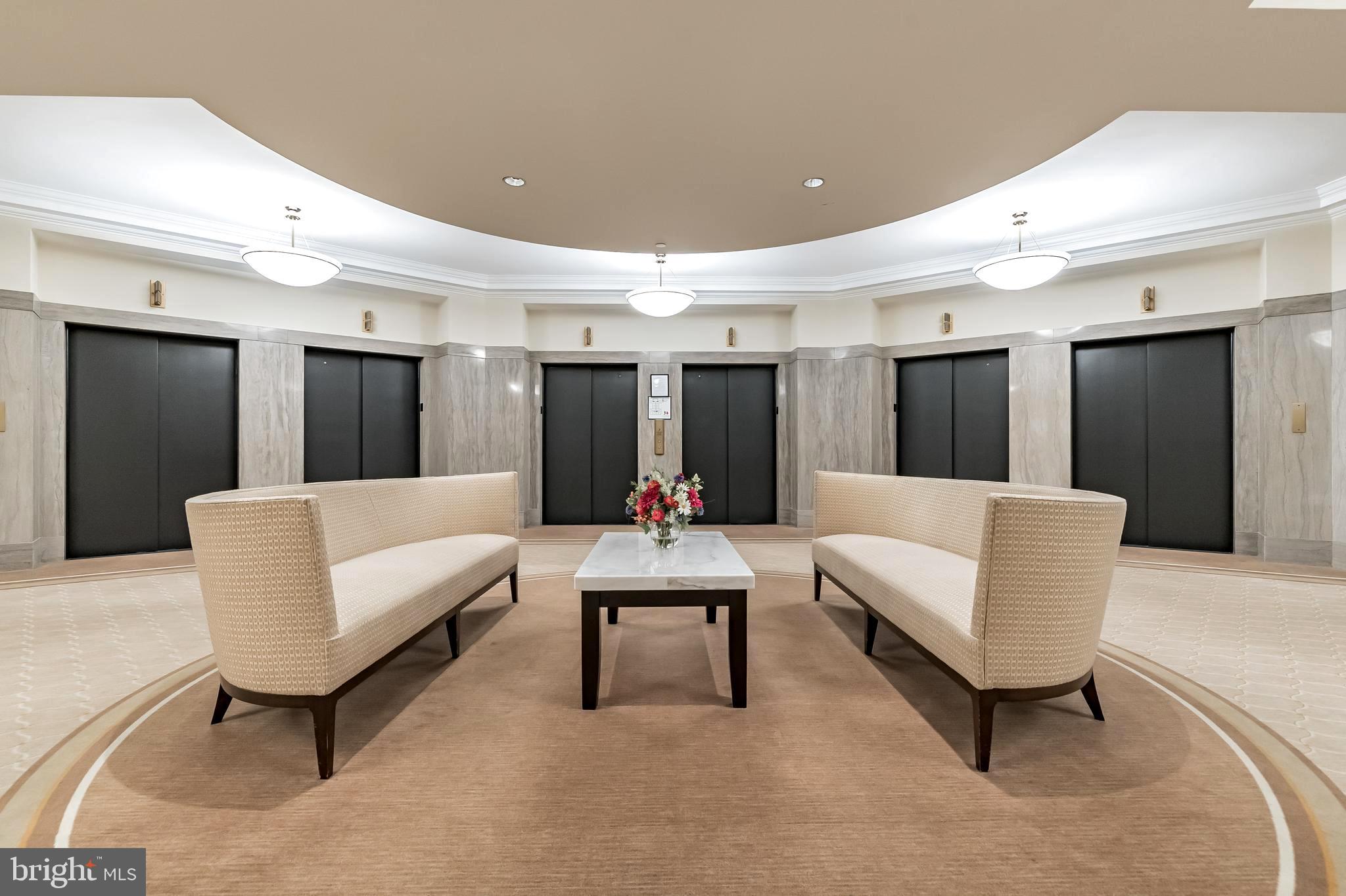 1600 Arch Street, Unit 1621 Philadelphia, PA 19103 - Photo 33 of 46 a living room with furniture and white walls