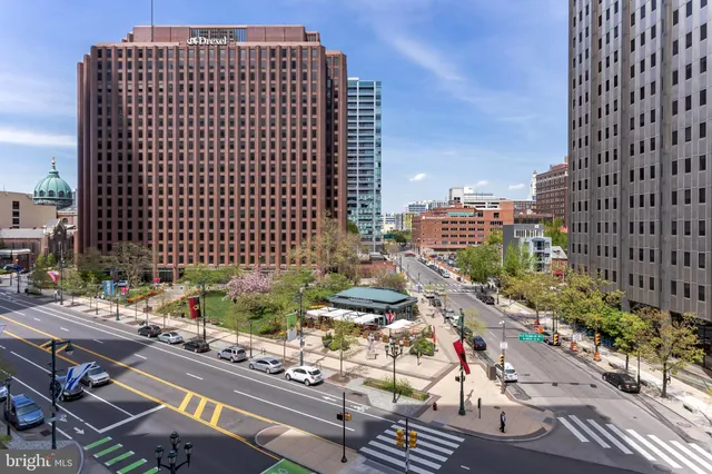 a view of a city with tall buildings