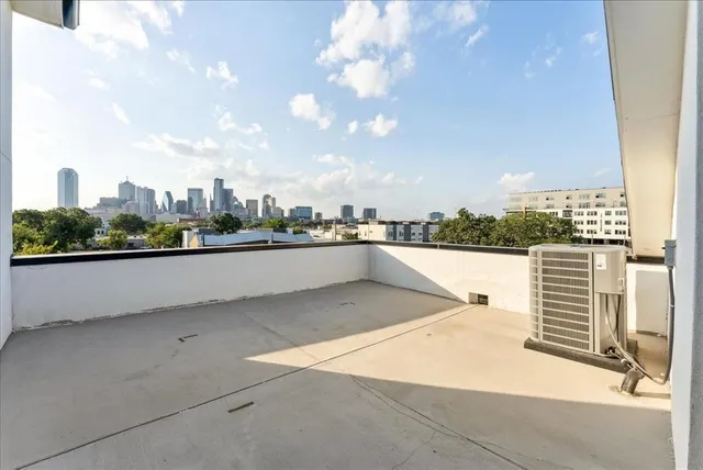 a view of a house with a small yard