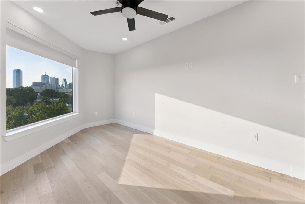 1512 Seegar Street, Unit 101 Dallas, TX 75215 - Photo 28 of 31 a view of an empty room with a window