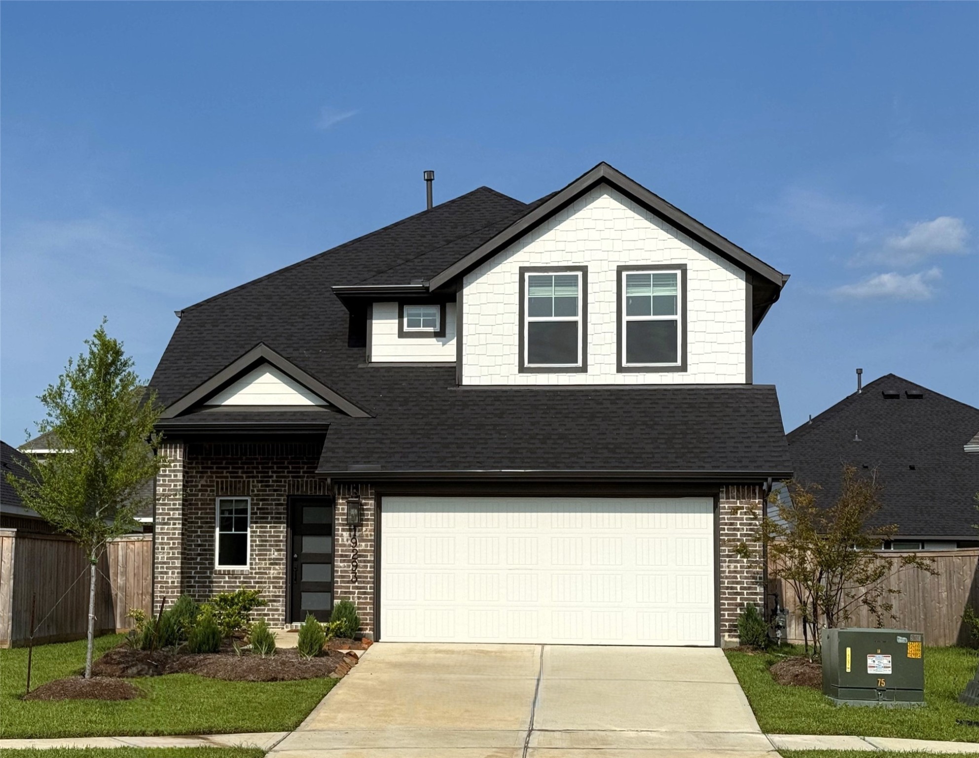 19293 Hazel Firs Court Magnolia, TX 77355 - Photo 1 of 36 a front view of a house with yard