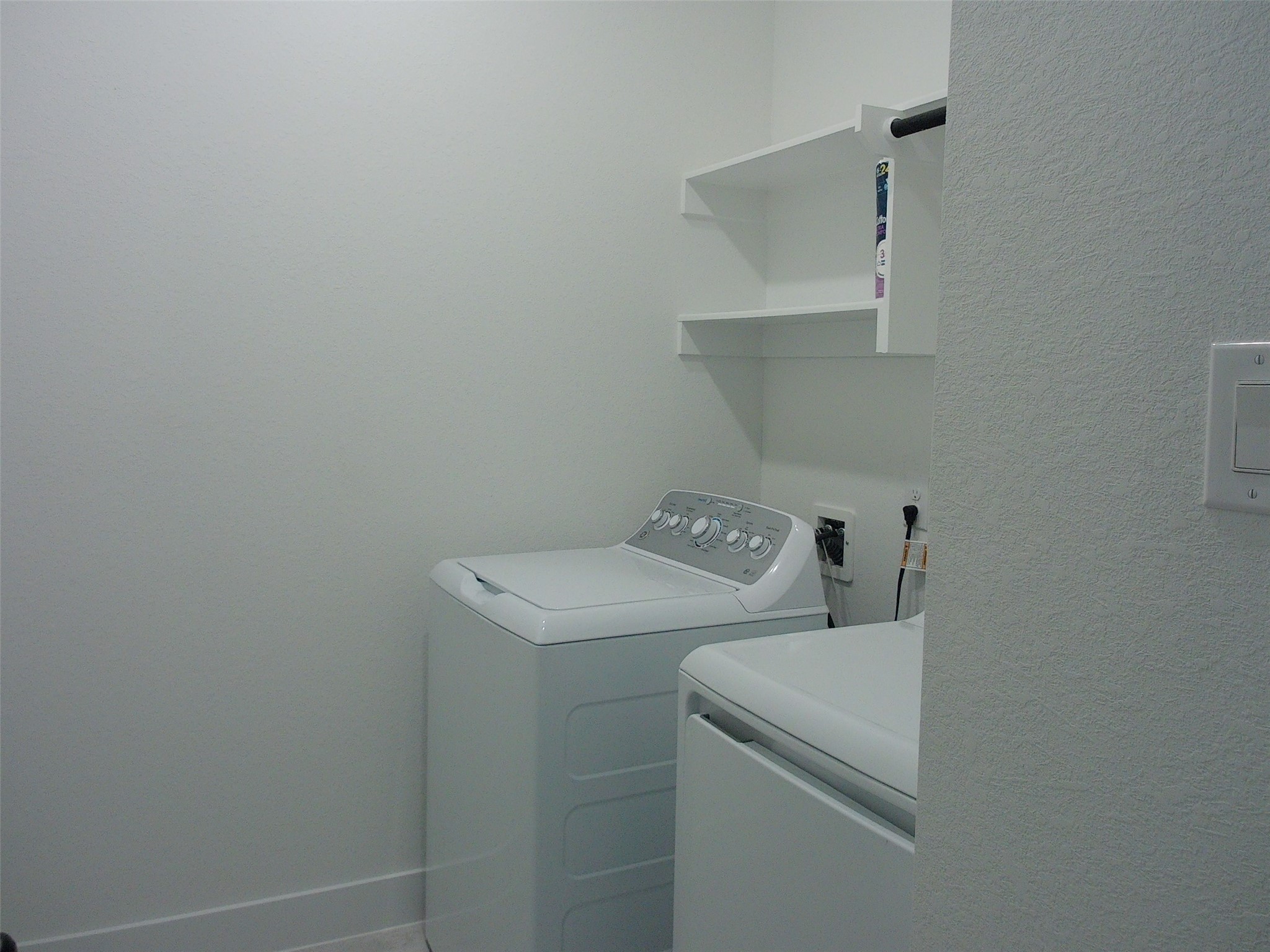 19293 Hazel Firs Court Magnolia, TX 77355 - Photo 16 of 36 a utility room with dryer and washer