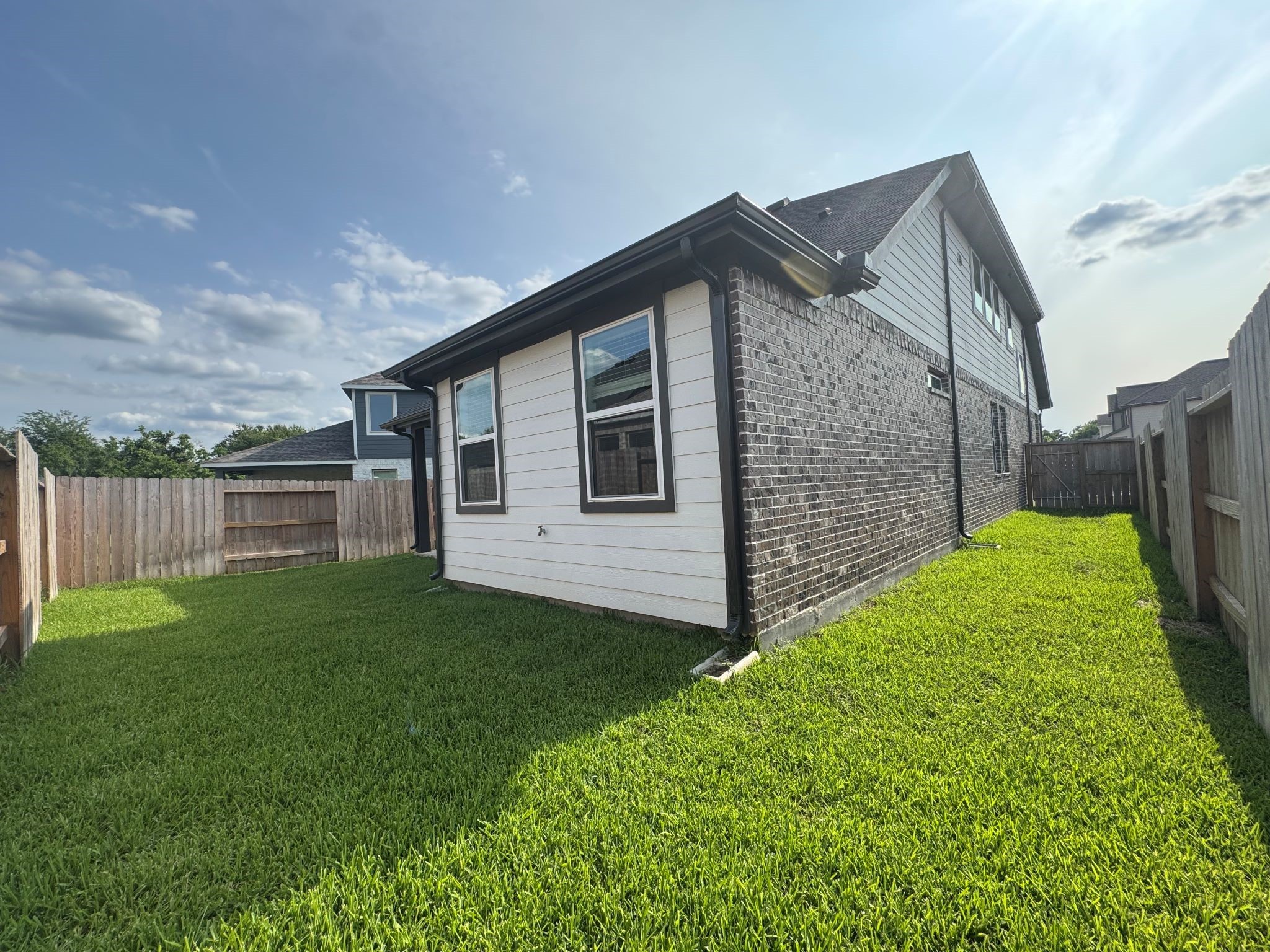 19293 Hazel Firs Court Magnolia, TX 77355 - Photo 30 of 36 a view of a house with backyard and garden