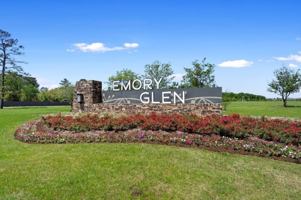 19293 Hazel Firs Court Magnolia, TX 77355 - Photo 35 of 36 a view of a garden with a building in the background