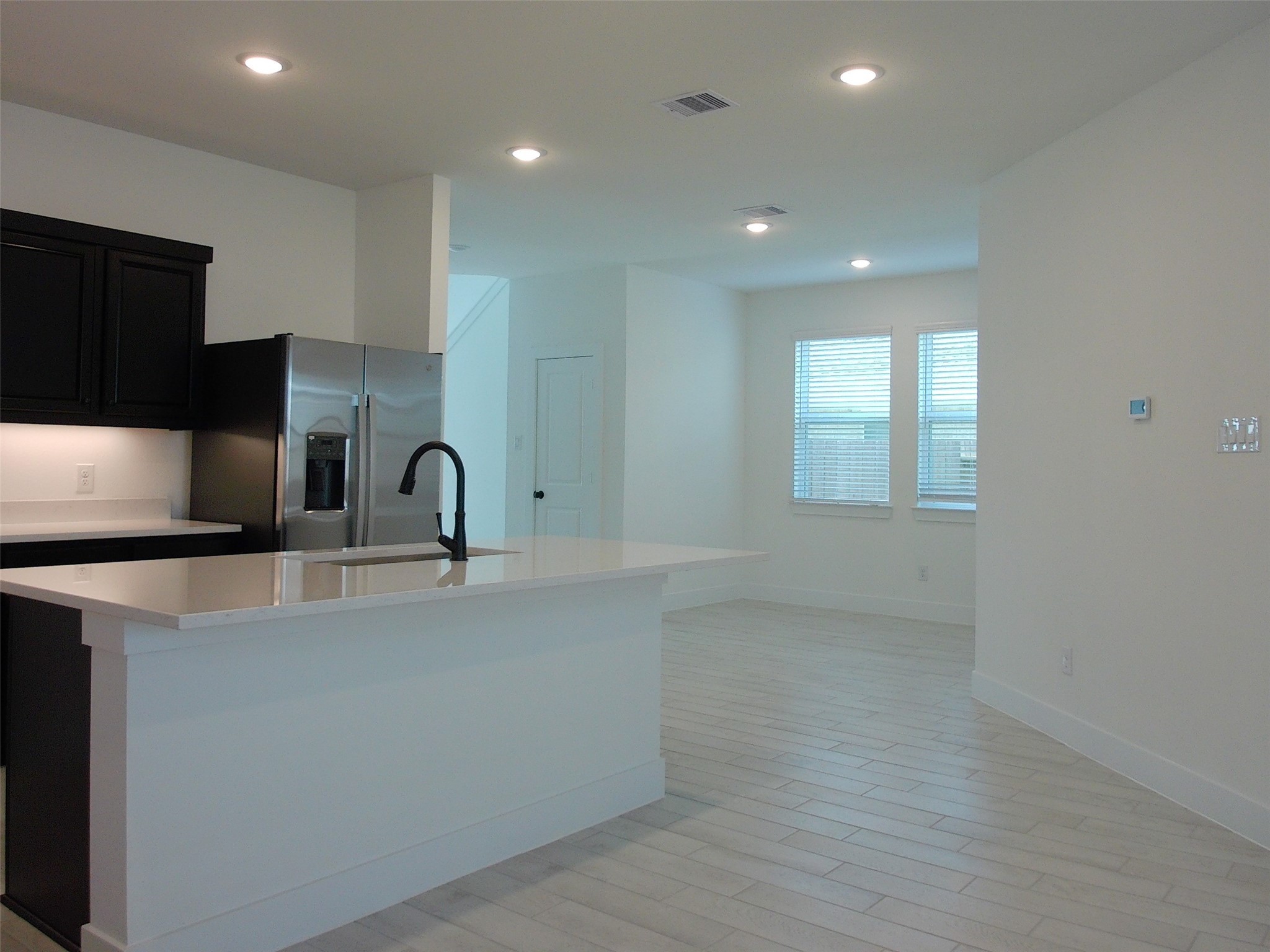 19293 Hazel Firs Court Magnolia, TX 77355 - Photo 6 of 36 a view of a kitchen with a sink and dishwasher