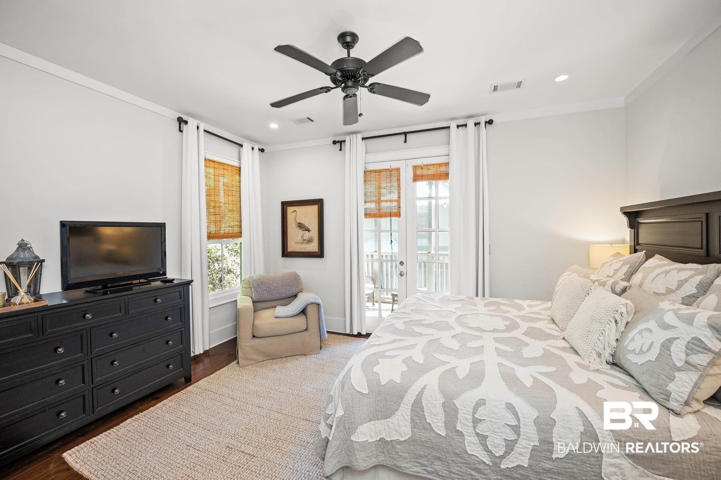 25773 Canal Road, Unit 28 Orange Beach, AL 36561 - Photo 18 of 48 Bedroom with wood finished floors, ceiling fan, recessed lighting, access to outside, and ornamental molding