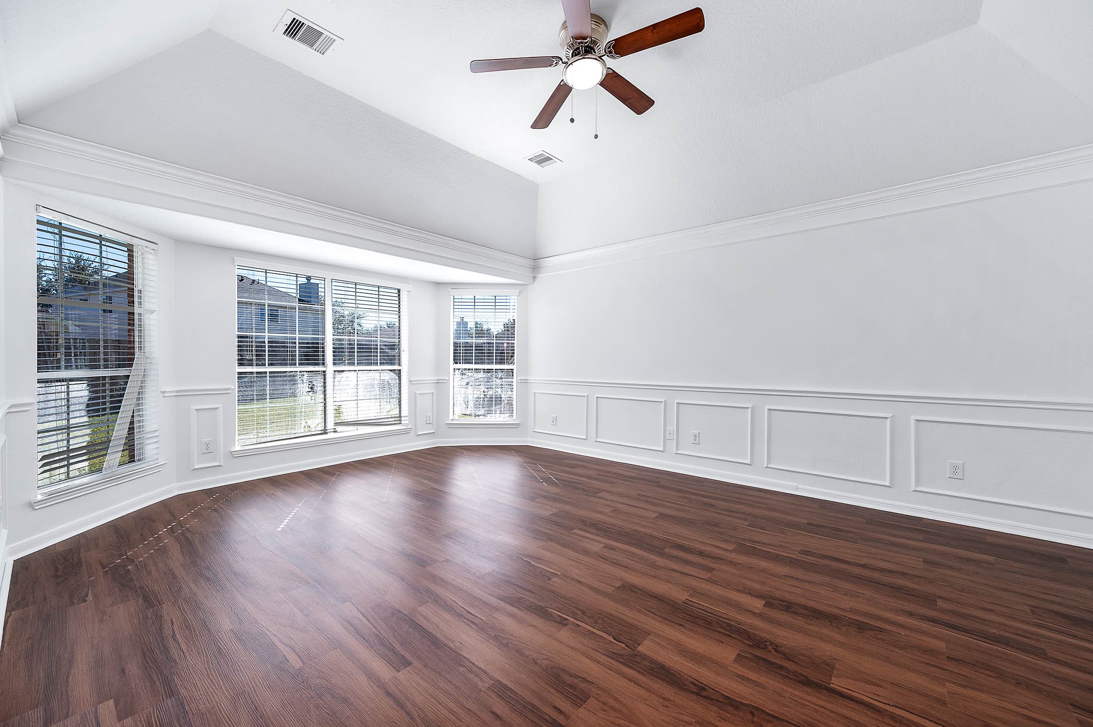13402 Timber Oak Court Rosharon, TX 77583 - Photo 16 of 34 a view of room with wooden floor and windows
