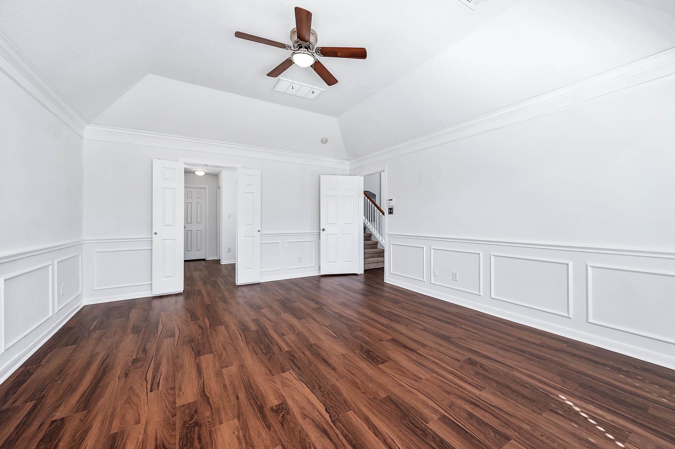 13402 Timber Oak Court Rosharon, TX 77583 - Photo 17 of 34 a view of empty room with wooden floor and fan