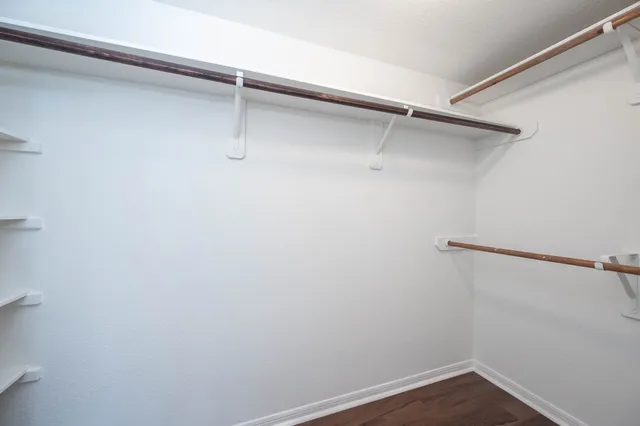 a view of a room with racks on the wall