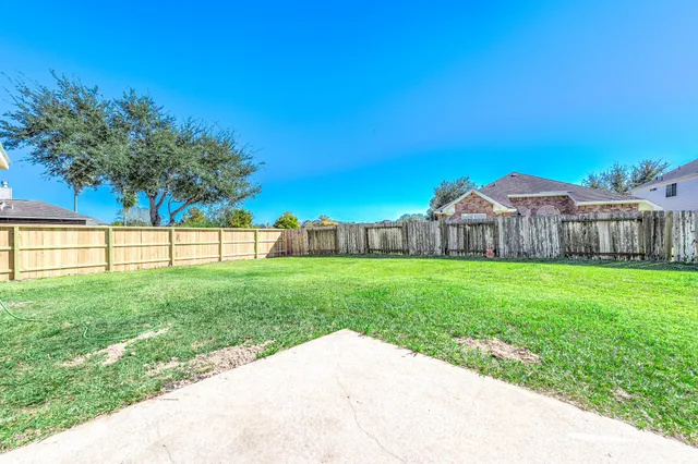 a view of a garden with a small yard