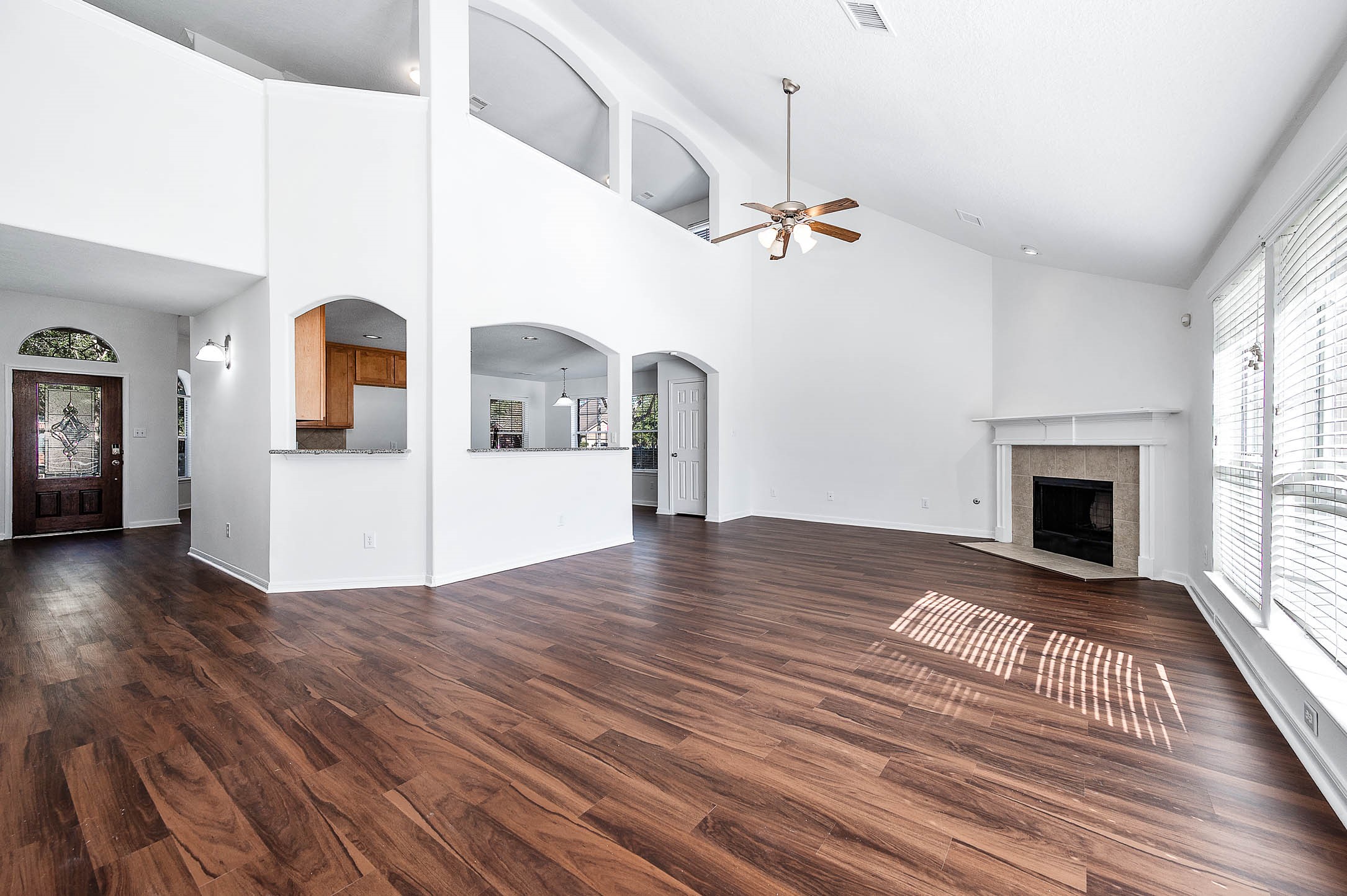 13402 Timber Oak Court Rosharon, TX 77583 - Photo 6 of 34 a view of a livingroom with wooden floor and fireplace