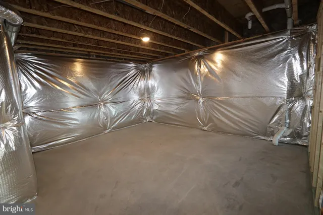 a view of a hallway with seating area