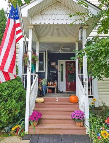 a front view of a house with entertaining space