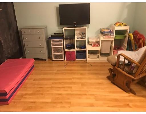 488 Delano Road Marion, MA 02738 - Photo 24 of 24 a room with furniture and a flat screen tv