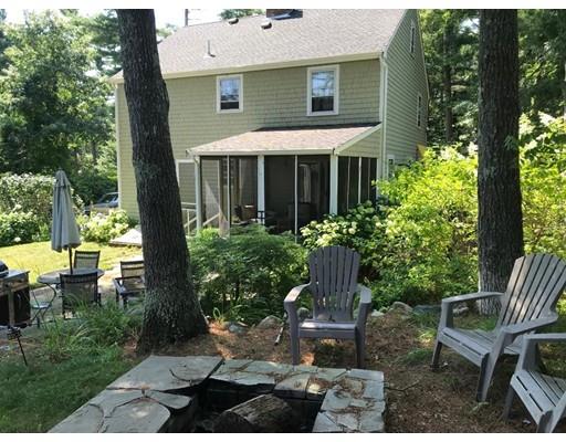 488 Delano Road Marion, MA 02738 - Photo 3 of 24 a view of a chair and table in backyard of the house