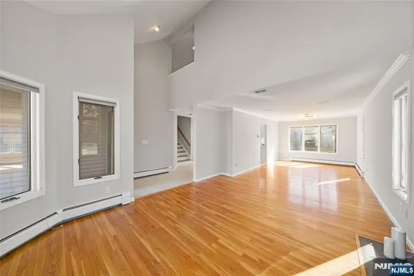 a view of a living room with a large window