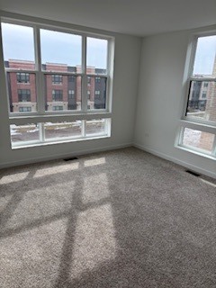369 Summit Circle Lombard, IL 60148 - Photo 10 of 11 a view of an empty room with a window