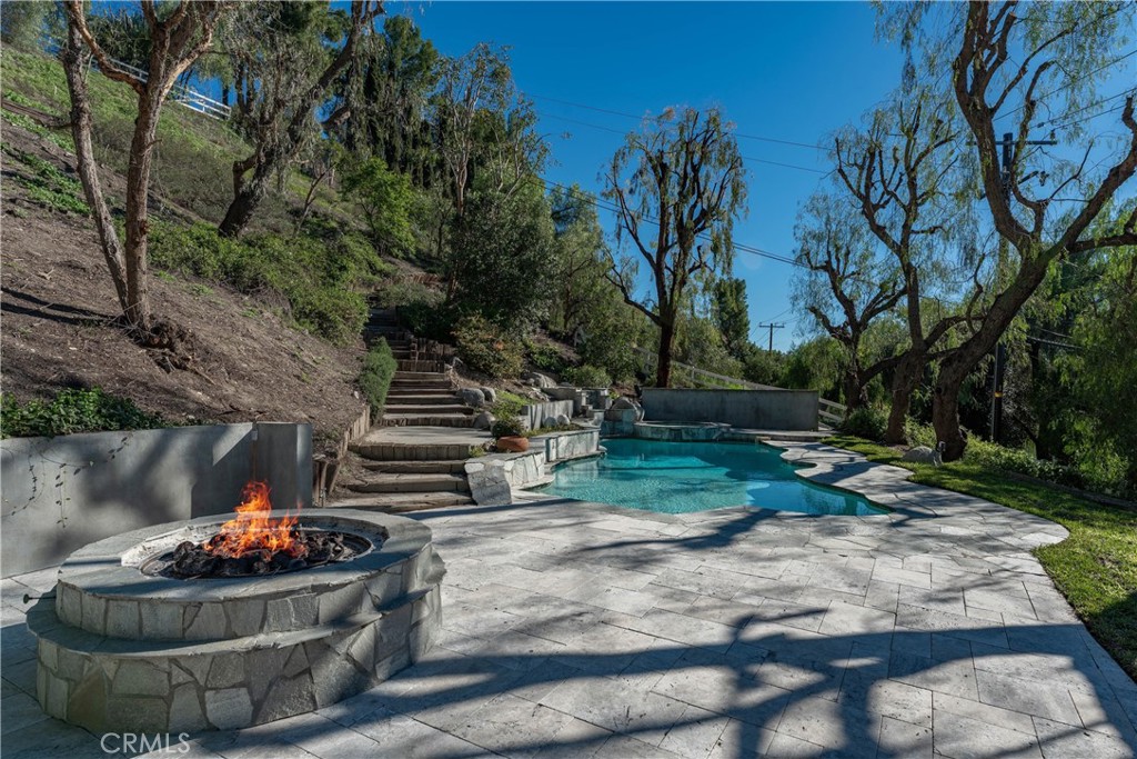 5550 Penland Road Hidden Hills, CA 91302 - Photo 49 of 55 Firepit (VIRTUALLY ENHANCED FIRE)