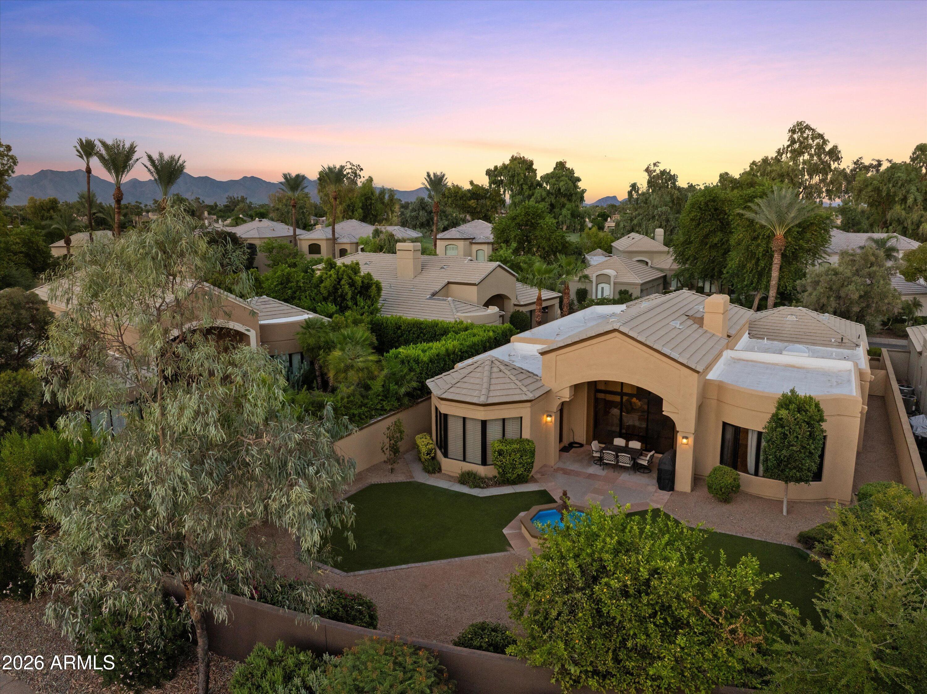 7323 East Gainey Ranch Road, Unit 18 Scottsdale, AZ 85258 - Photo 6 of 90 Backyard drone