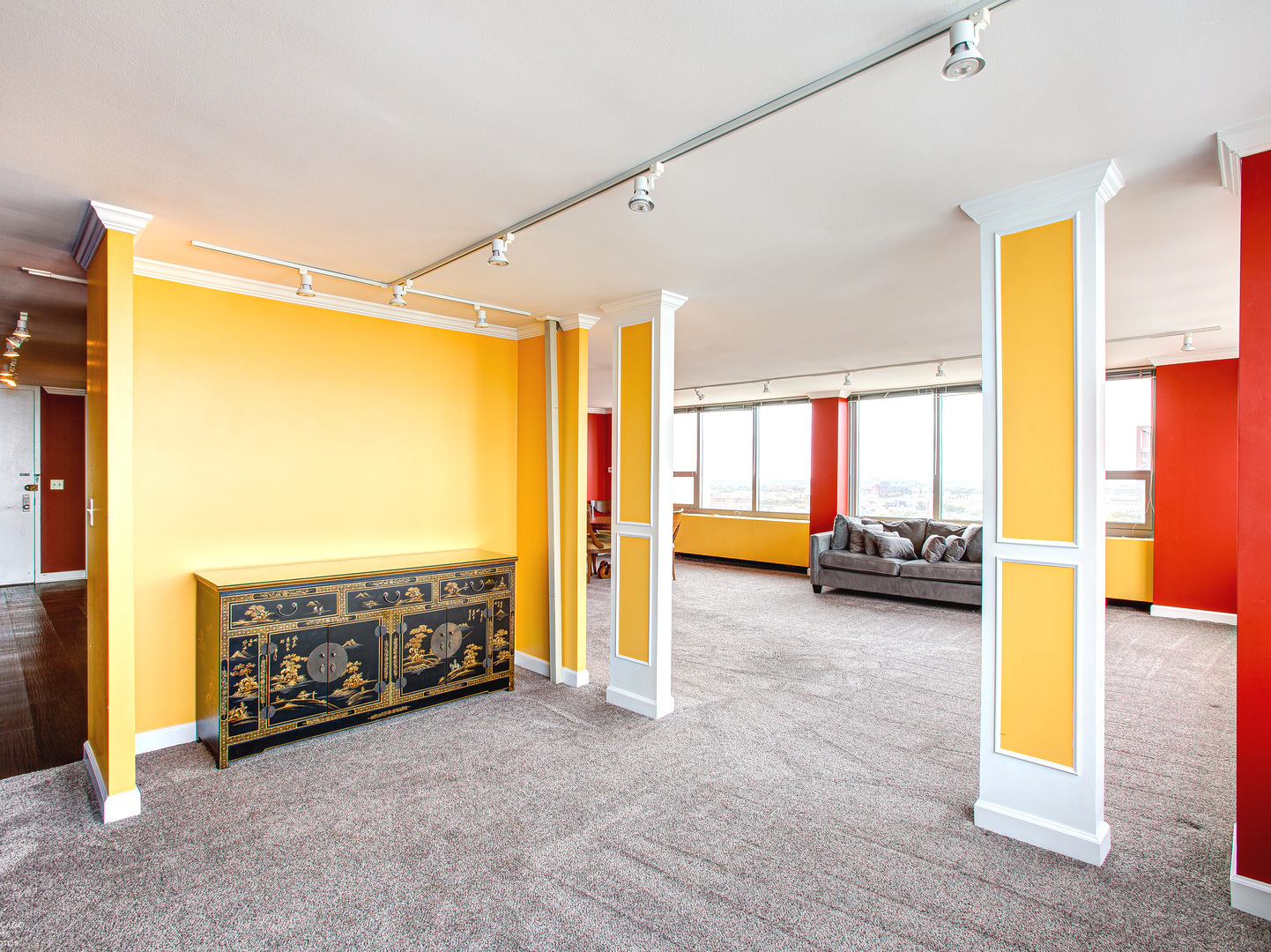 1700 East 56th Street, Unit 2907 Chicago, IL 60637 - Photo 11 of 17 a view of front door with furniture and a garage