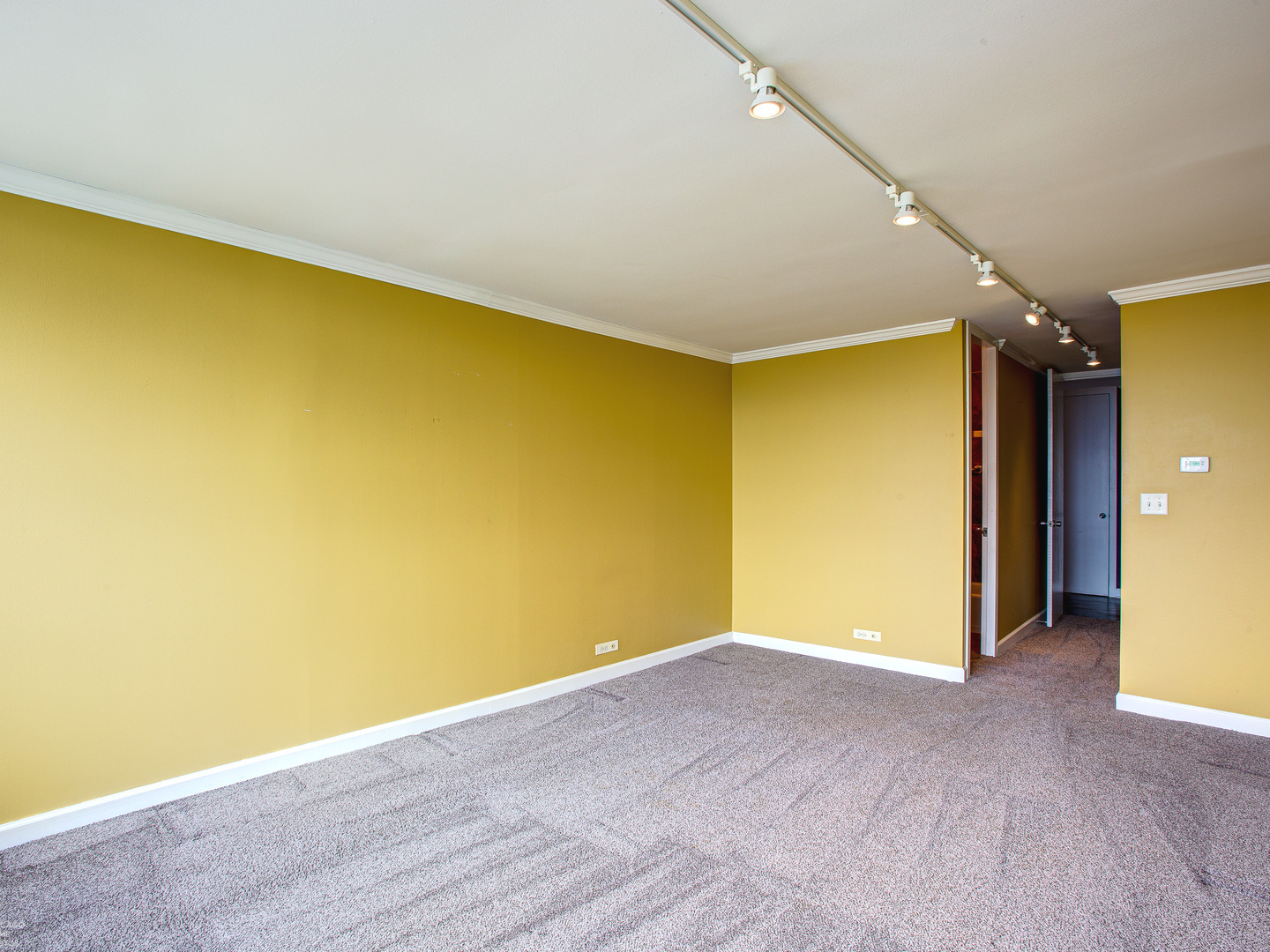 1700 East 56th Street, Unit 2907 Chicago, IL 60637 - Photo 13 of 17 a view of empty room with wooden floor