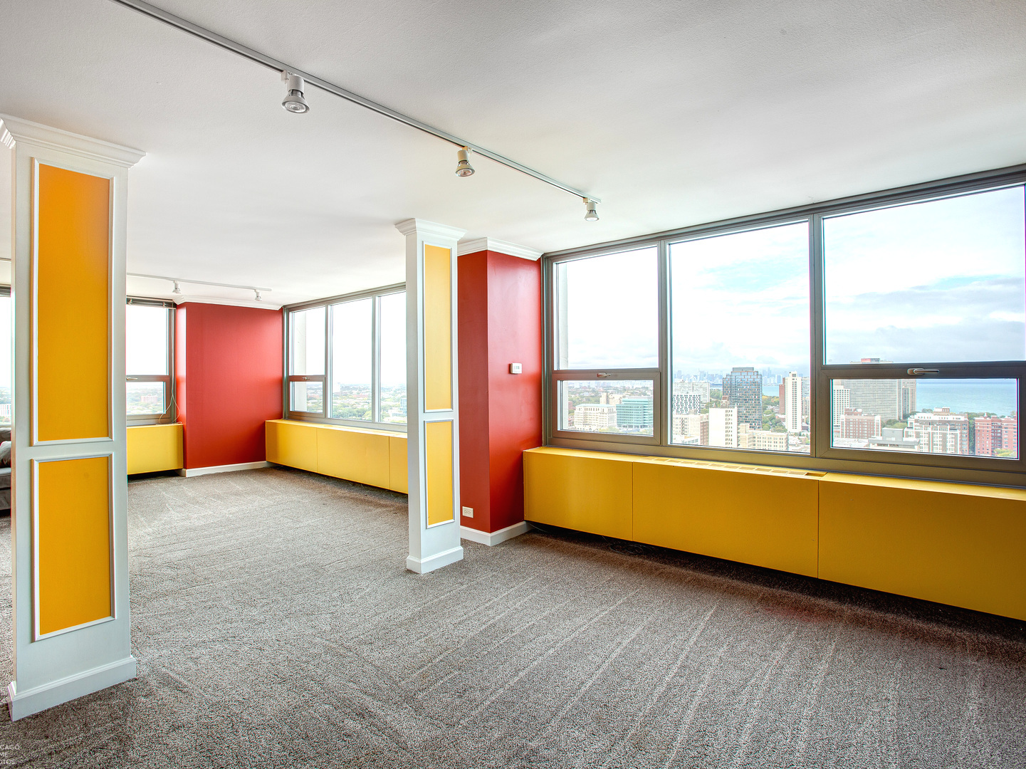 1700 East 56th Street, Unit 2907 Chicago, IL 60637 - Photo 10 of 17 a view of an empty room with window