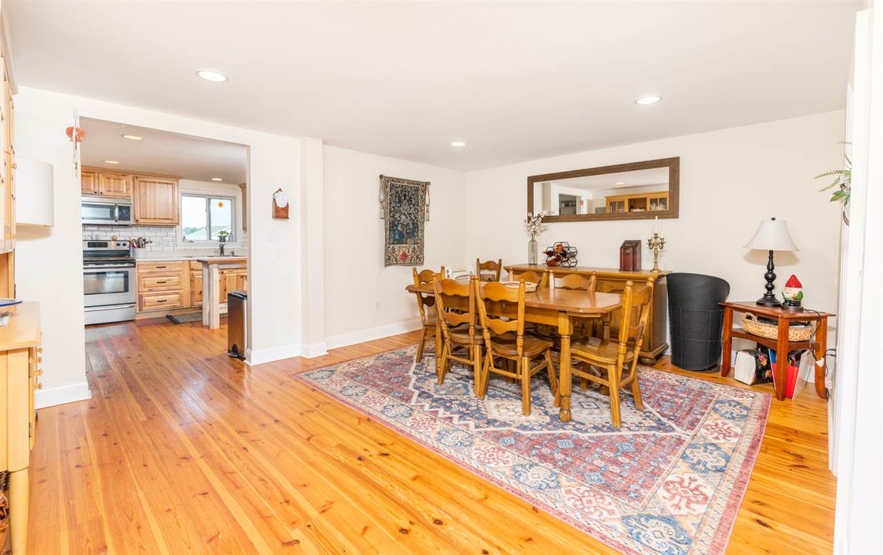 352 Battlefield Road Waynesboro, VA 22980 - Photo 14 of 46 a view of a dining room with furniture and wooden floor