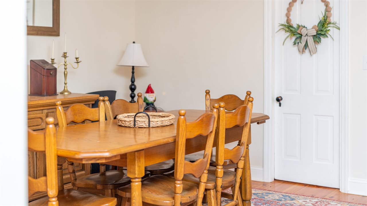 352 Battlefield Road Waynesboro, VA 22980 - Photo 15 of 46 a dining room with furniture and a window