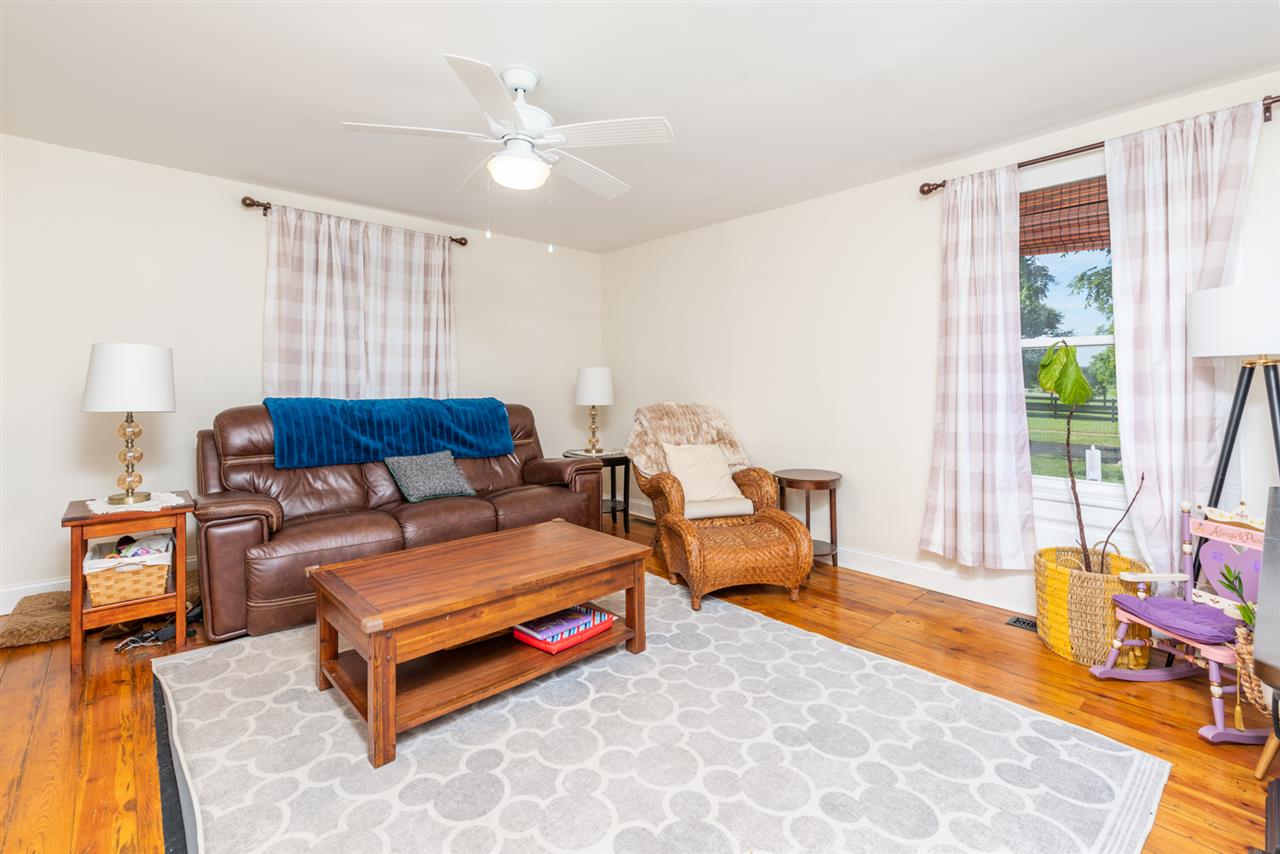 352 Battlefield Road Waynesboro, VA 22980 - Photo 17 of 46 a living room with furniture and a table