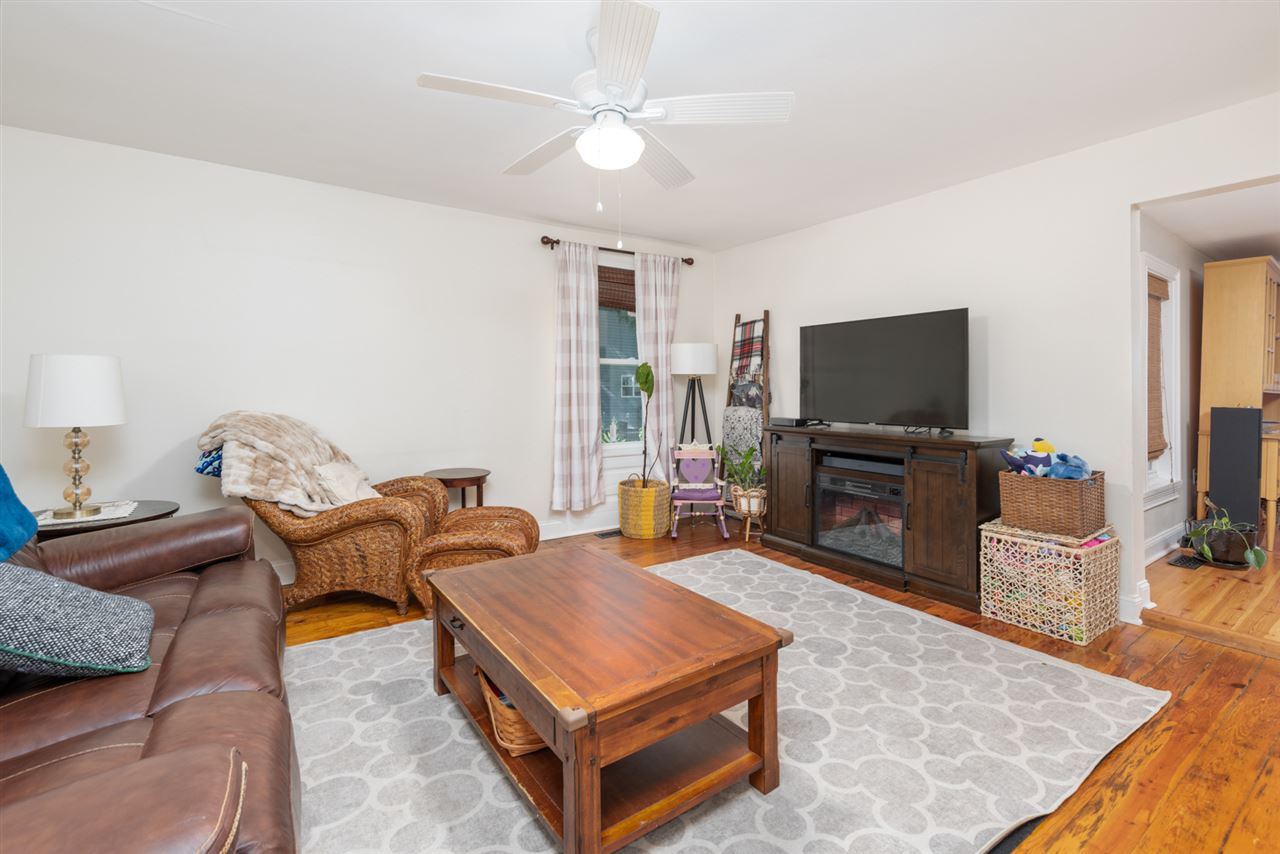 352 Battlefield Road Waynesboro, VA 22980 - Photo 18 of 46 a living room with furniture and a flat screen tv