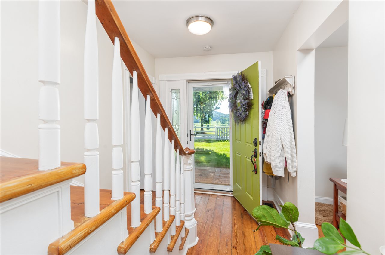 352 Battlefield Road Waynesboro, VA 22980 - Photo 19 of 46 a view of an entryway with wooden floor and stairs