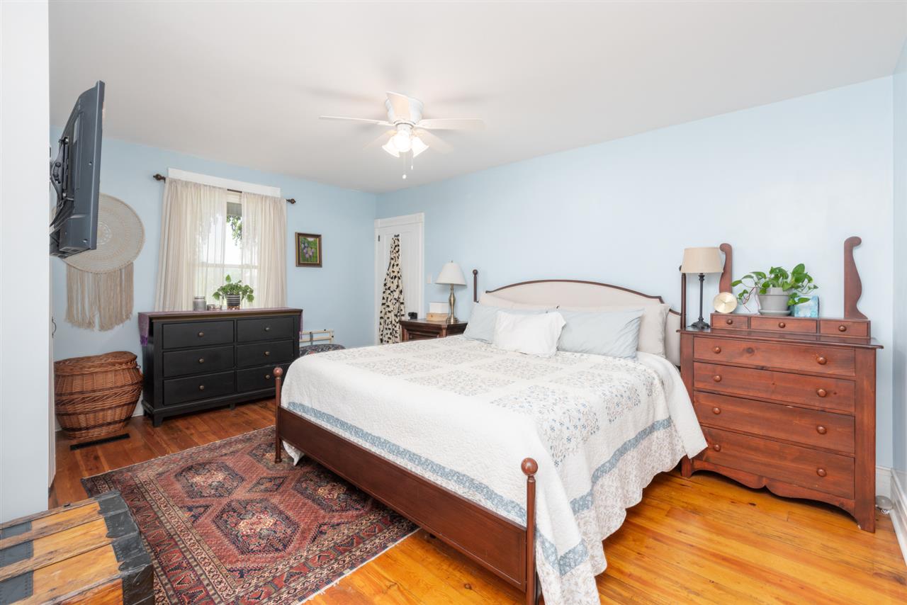 352 Battlefield Road Waynesboro, VA 22980 - Photo 20 of 46 a bedroom with a bed and a dresser