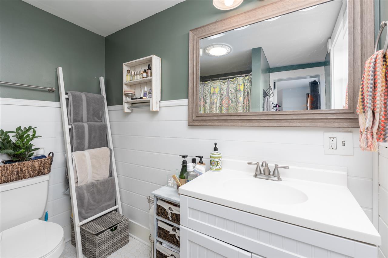 352 Battlefield Road Waynesboro, VA 22980 - Photo 23 of 46 a bathroom with a toilet sink and mirror