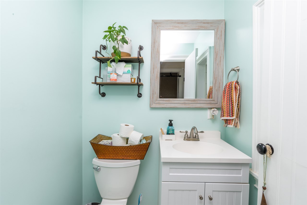 352 Battlefield Road Waynesboro, VA 22980 - Photo 25 of 46 a bathroom with a sink mirror and toilet