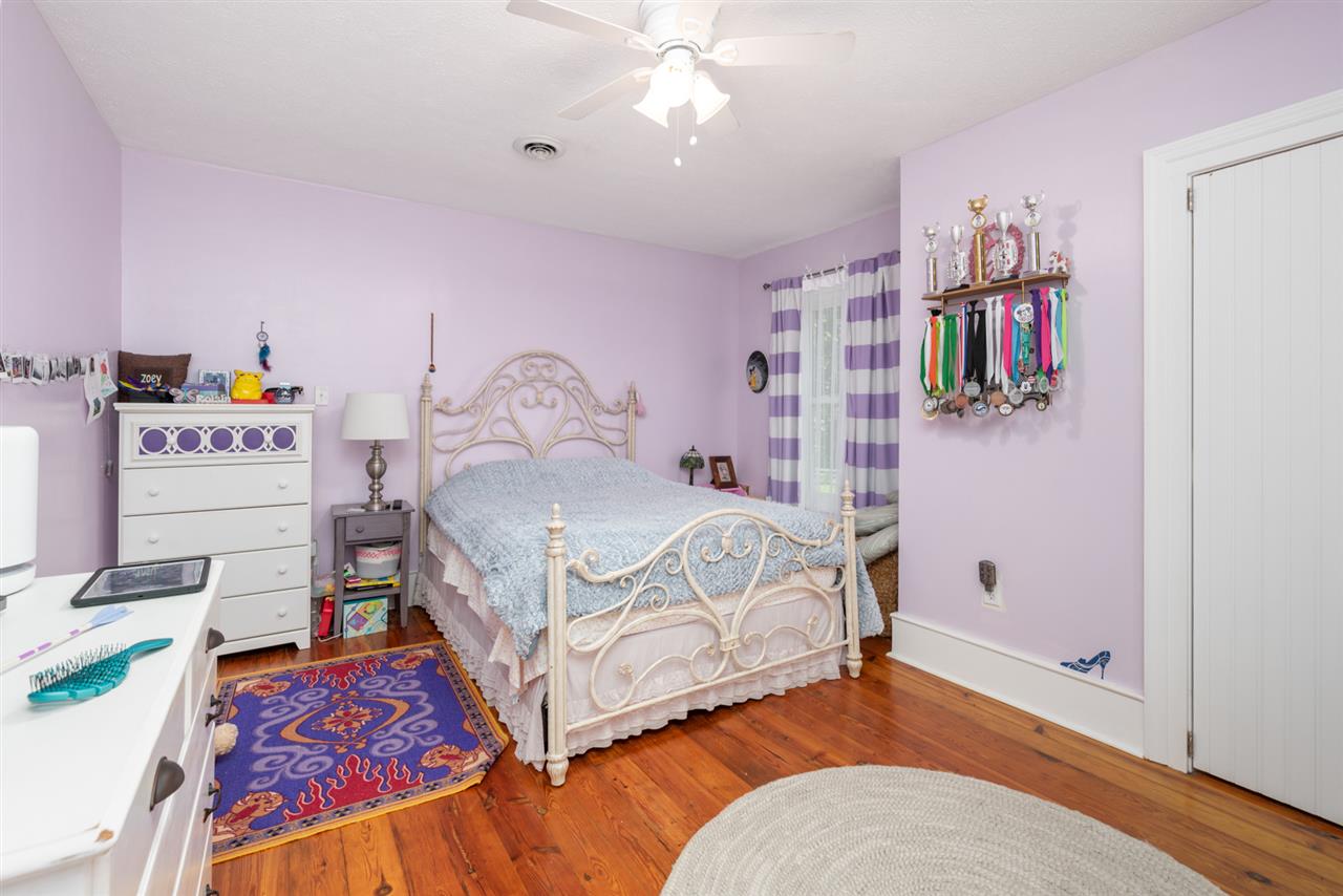 352 Battlefield Road Waynesboro, VA 22980 - Photo 31 of 46 a bedroom with a bed and a book shelf