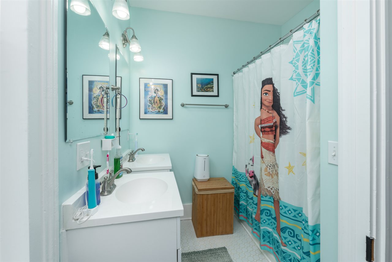 352 Battlefield Road Waynesboro, VA 22980 - Photo 35 of 46 a bathroom with a sink mirror and vanity