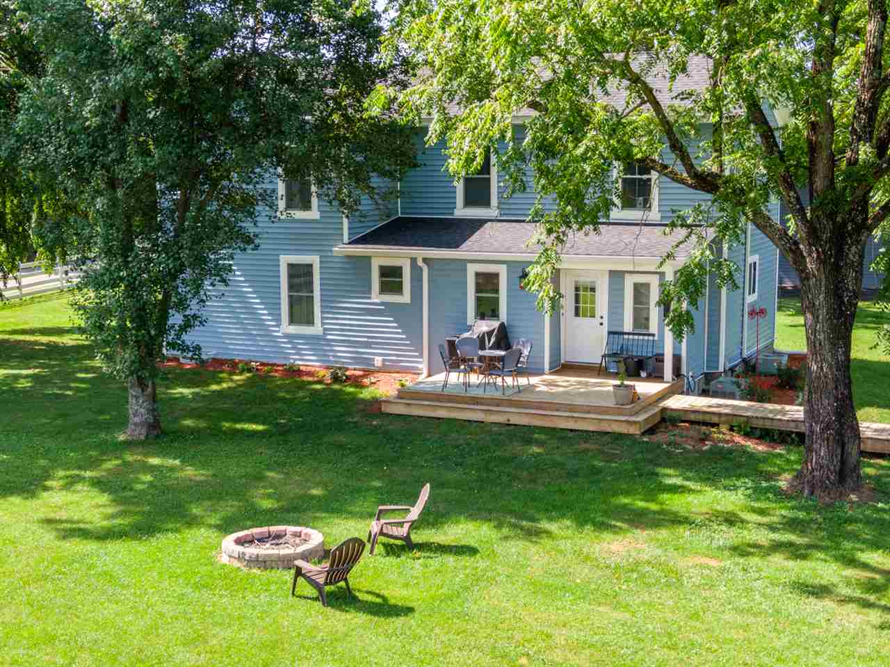 352 Battlefield Road Waynesboro, VA 22980 - Photo 7 of 46 a front view of a house with garden and a patio