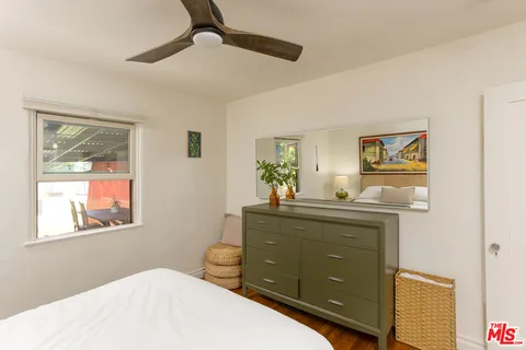 a swimming pool with outdoor seating and yard