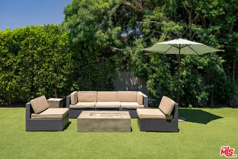 a view of a back yard of the house