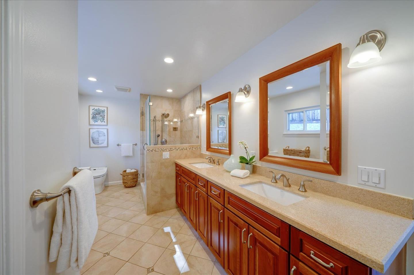 1122 Southdown Road Hillsborough, CA 94010 - Photo 13 of 42 a bathroom with a sink double vanity