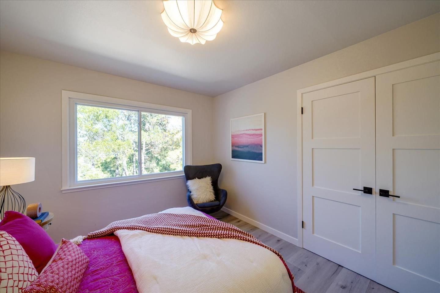 1122 Southdown Road Hillsborough, CA 94010 - Photo 18 of 42 a bedroom with a bed and a window