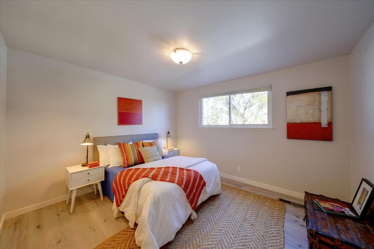 1122 Southdown Road Hillsborough, CA 94010 - Photo 20 of 42 a bedroom with a bed and a window