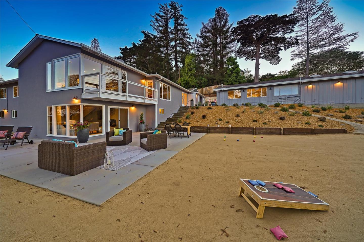 1122 Southdown Road Hillsborough, CA 94010 - Photo 2 of 42 a front view of a house with lake view and a trees