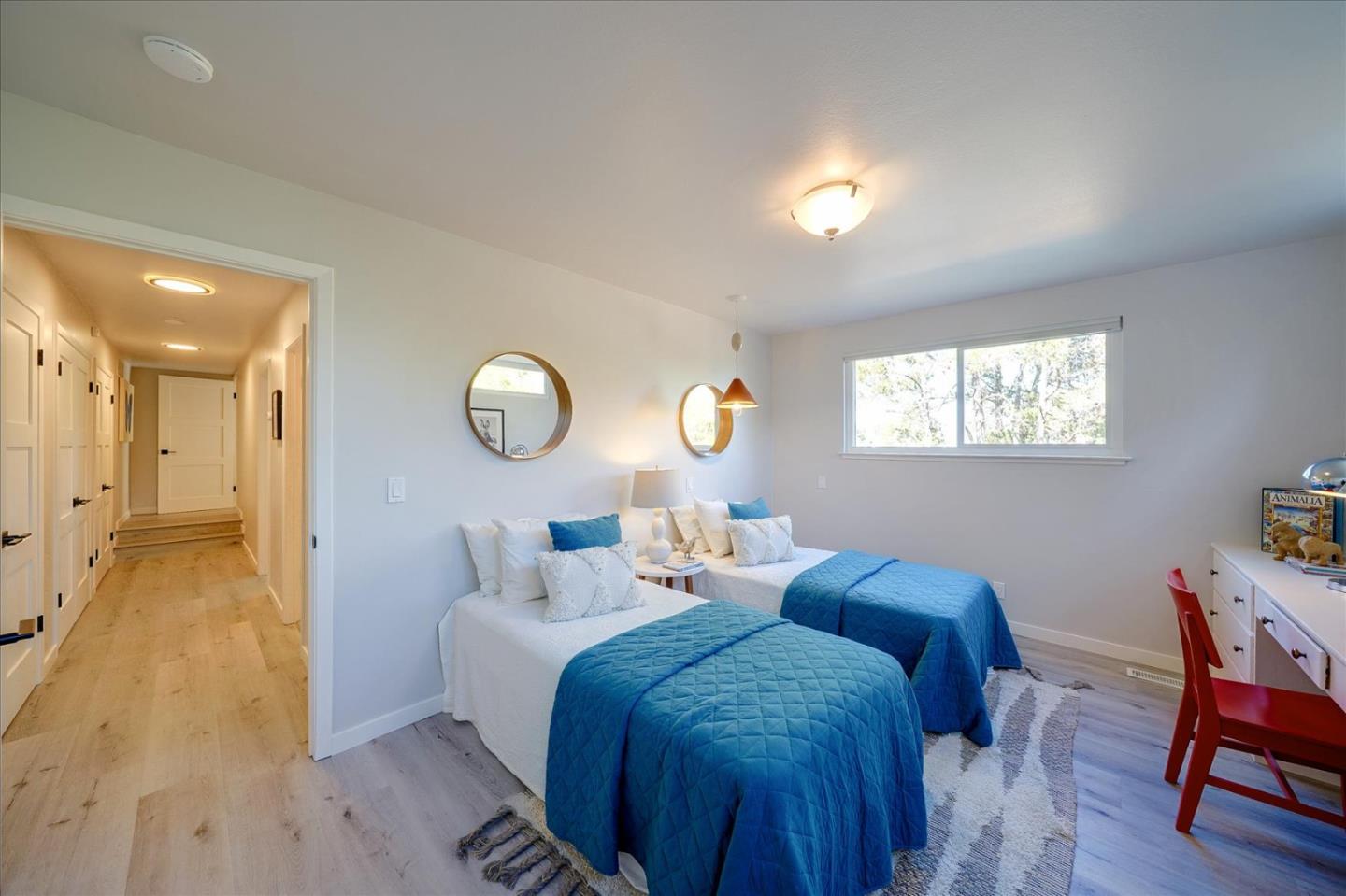 1122 Southdown Road Hillsborough, CA 94010 - Photo 22 of 42 a bed room with two beds and a chair